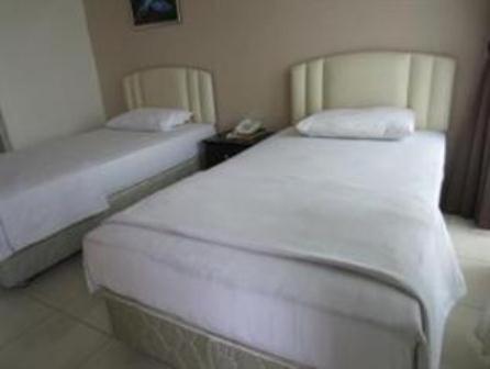 Mendu Inn กูชิง ห้อง รูปภาพ